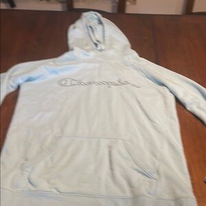 Vintage Champion women’s Light Blue Hoodie Sweater in good but used condition